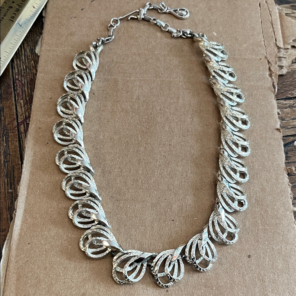Vintage Coro Swirly Silvertone Necklace Marked 35$